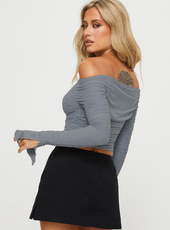 side view of model wearing Princess Polly Moreno Off The Shoulder Top Blue Full Sleeves straight 