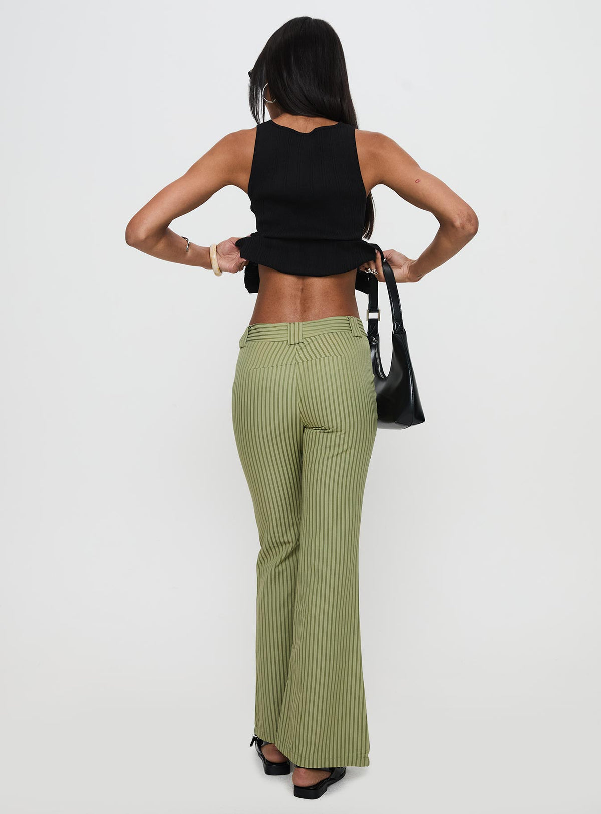 back view of model wearing Princess Polly Jinxed Pant Green Stripe Pants 