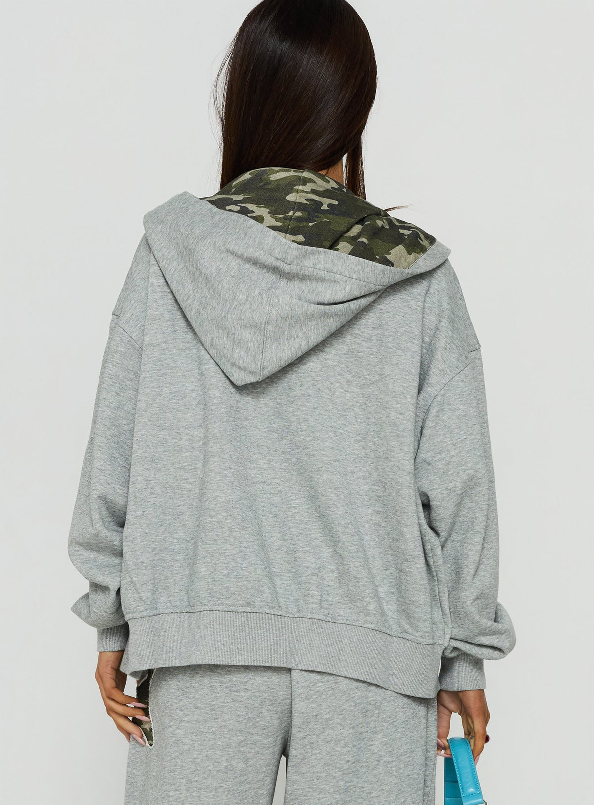 Explore the Chelzie Zip Through Graphic Hoodie Grey Marle / Camo in womens jumpers with oversized fit, hood details, camo print, and short length back view of model wearing Princess Polly