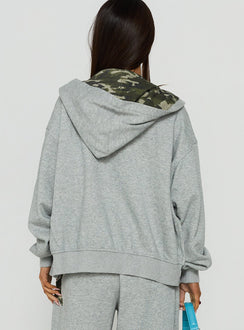 Explore the Chelzie Zip Through Graphic Hoodie Grey Marle / Camo in womens jumpers with oversized fit, hood details, camo print, and short length back view of model wearing Princess Polly