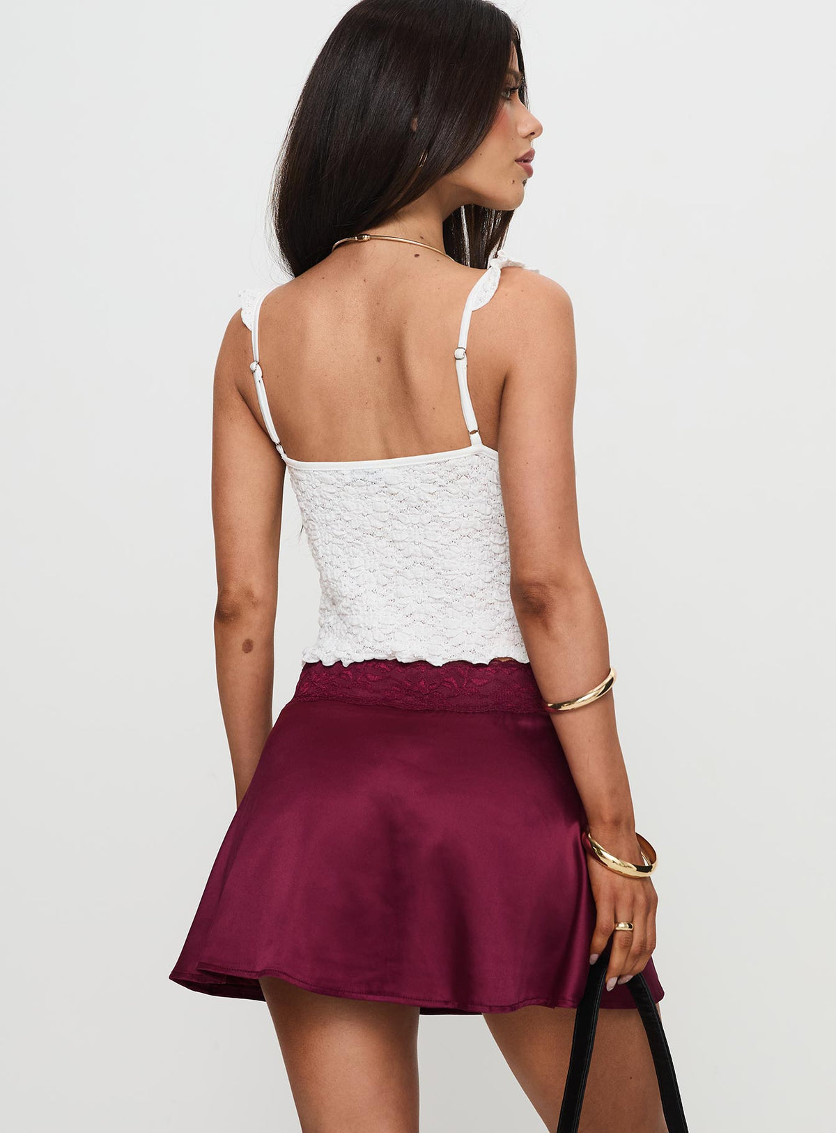back view of model wearing Princess Polly For Me Mini Skirt Burgundy Mini Skirts Skirts 