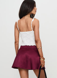 back view of model wearing Princess Polly For Me Mini Skirt Burgundy Mini Skirts Skirts 