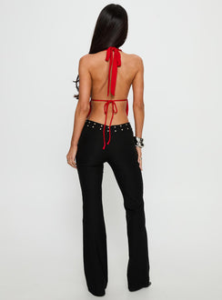 Showcasing the Yevina Eyelet Flare Pant Black Petite womens-regular-pants with high-rise waist back view of model wearing