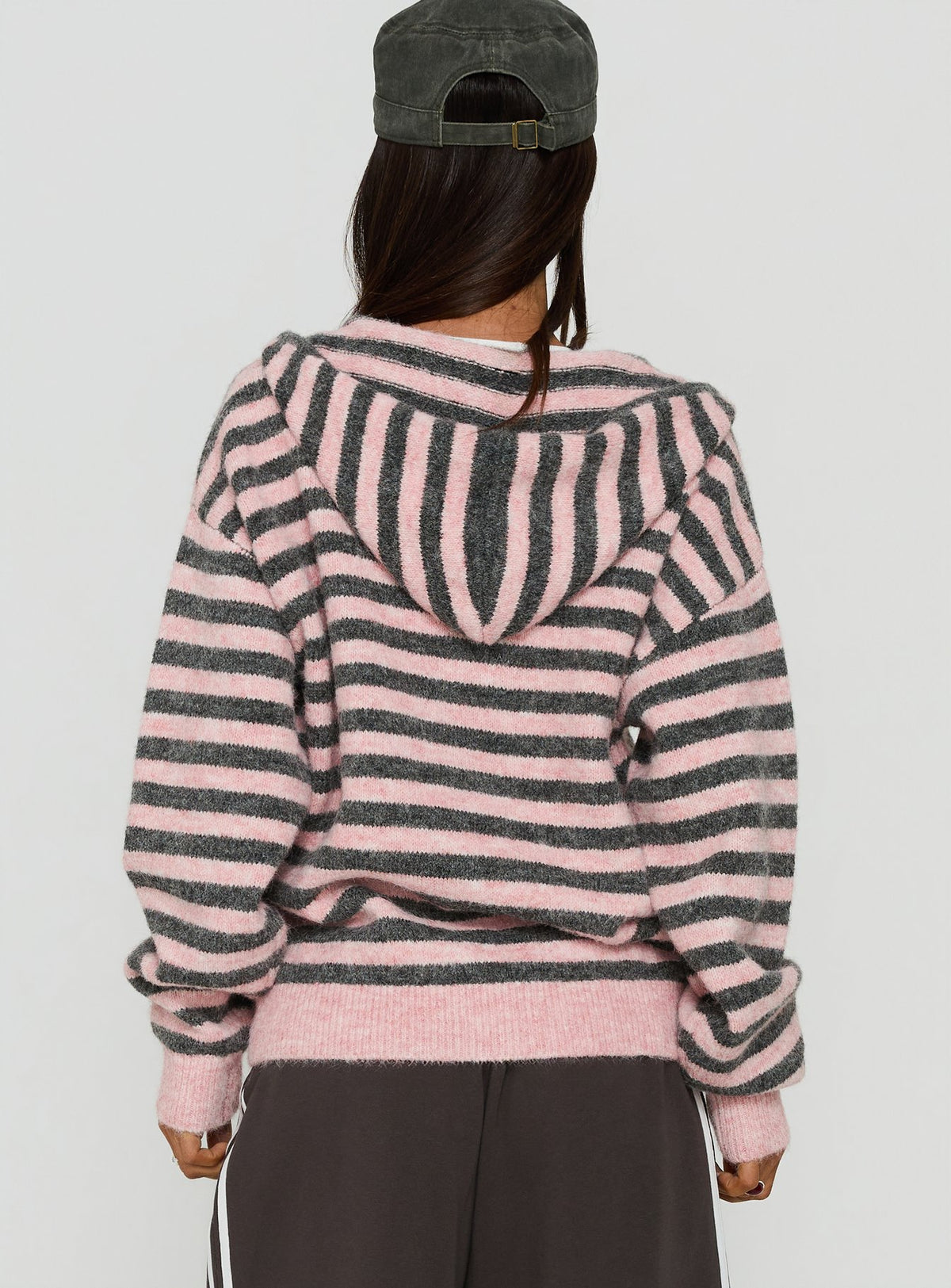 Displaying the Aubry Oversized True Knit Hoodie Pink Stripe womens-jumpers in short length back view of model wearing Princess Polly