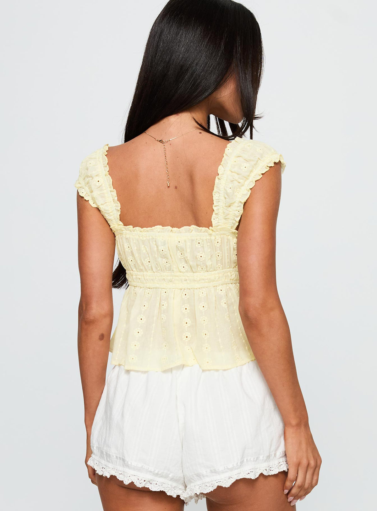 back view of model wearing Princess Polly Summerfield Top Lemon Short Sleeves Square Neck 
