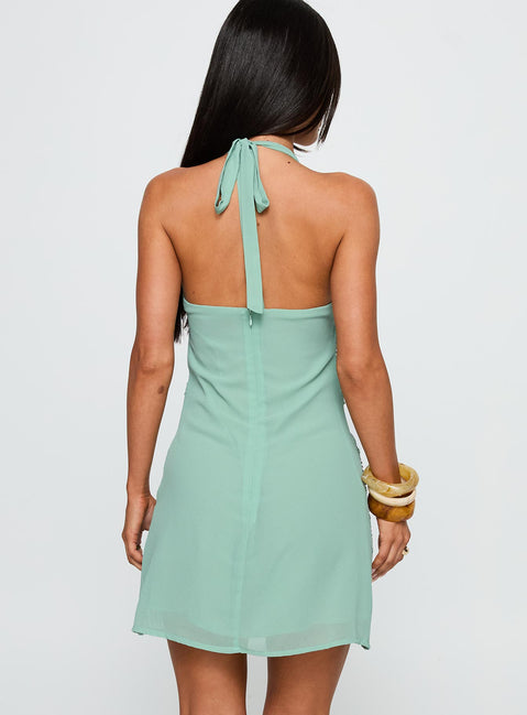 back view of model wearing Princess Polly Telenova Halter Mini Dress Green Plunger 