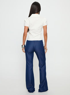 back view of model wearing Princess Polly Kinkirk Flared Pants Chambray Mid Rise Pants Pants 