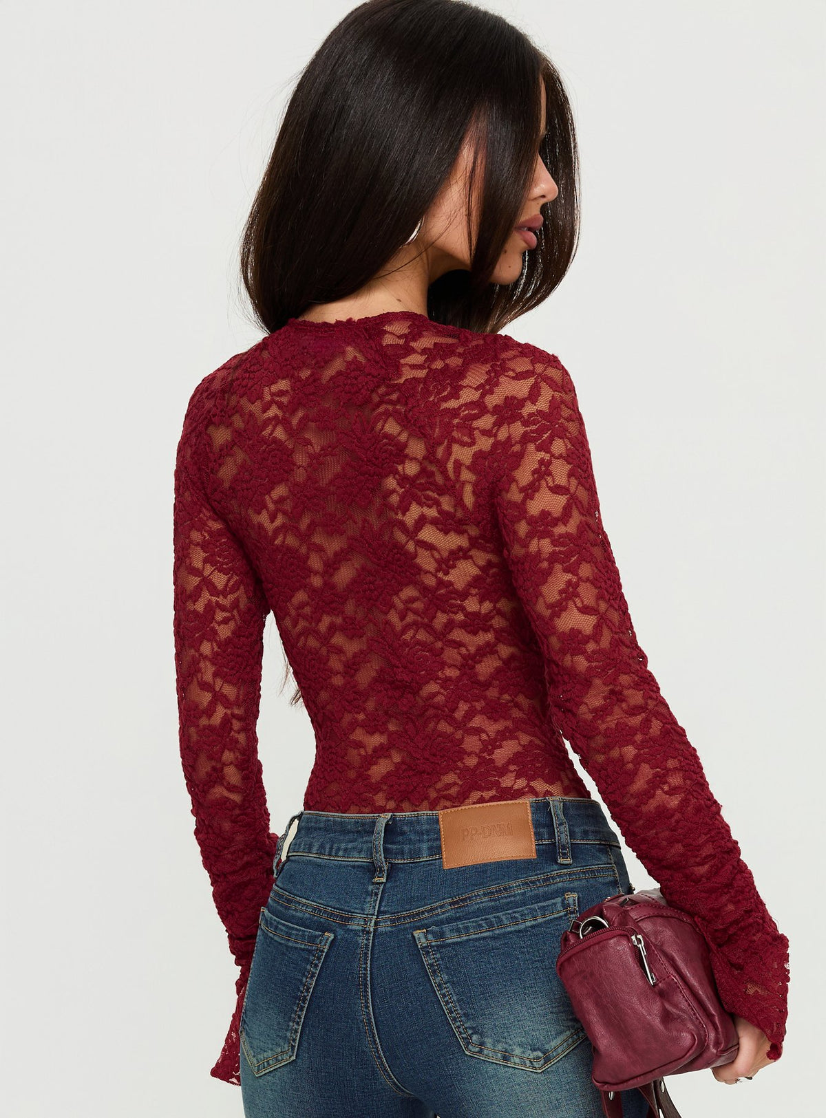 back view of model wearing Princess Polly Giallo Long Sleeve Bodysuit Burgundy Long Sleeve Tops Bodysuit 