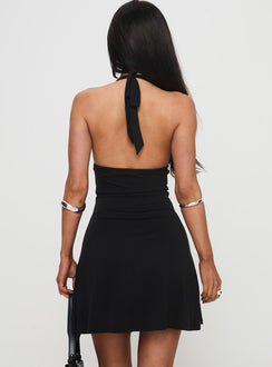 back view of model wearing Princess Polly Tinisie Halter Mini Dress Black Tall Plunger 