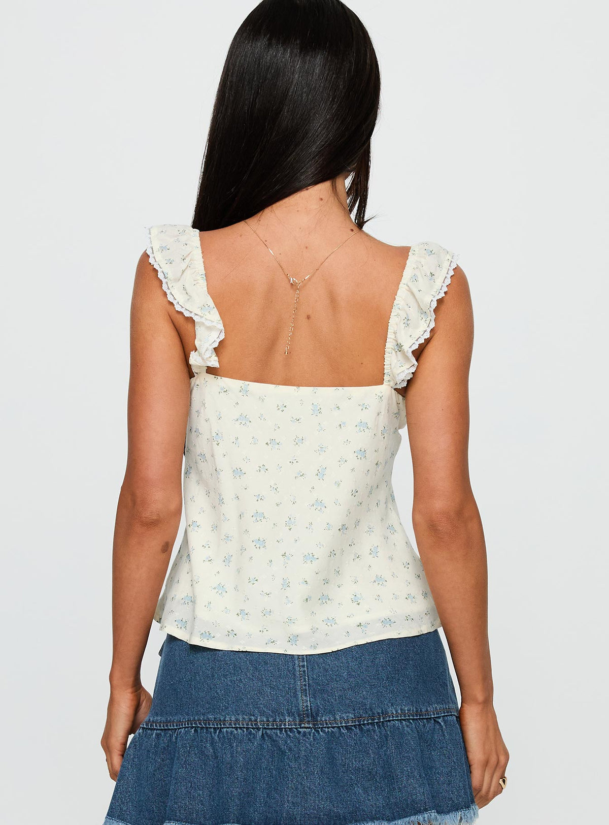 back view of model wearing Princess Polly Madaleine Top Floral Sleeveless Sweetheart 