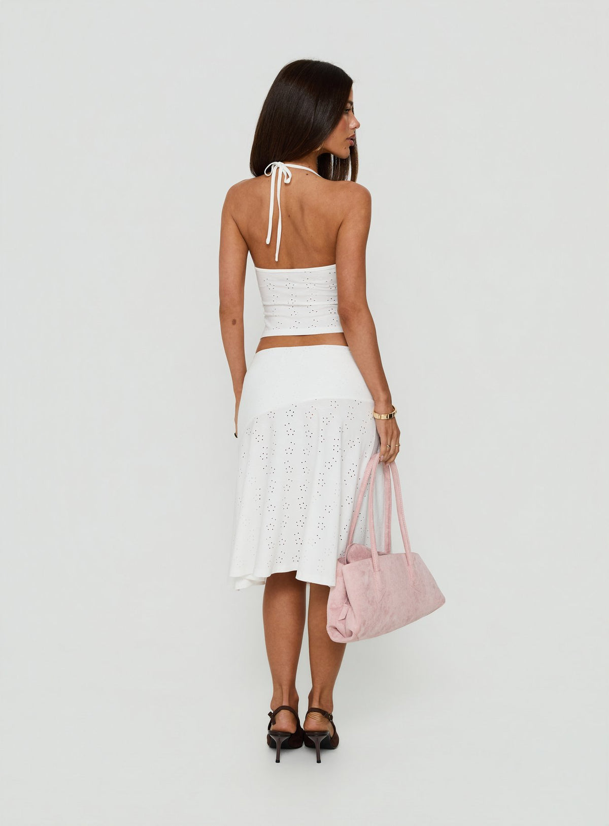 Displaying the Opalie Asymmetrical Midi Skirt White Broderie in womens-skirts with lace hemline back view of model wearing Princess Polly