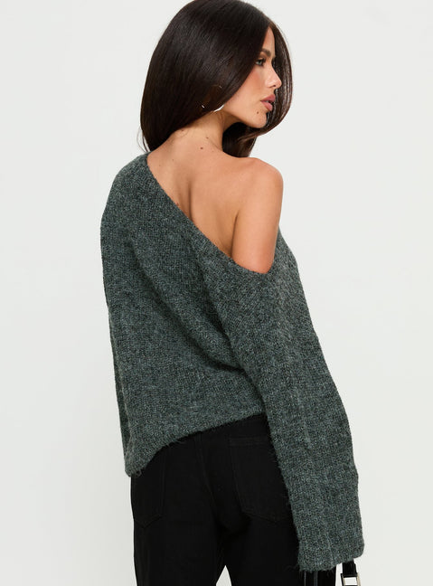 Highlighting the Delyn Off Shoulder Slouchy Knit Sweater in Black Marle, a womens jumper with short length back view of model wearing Princess Polly