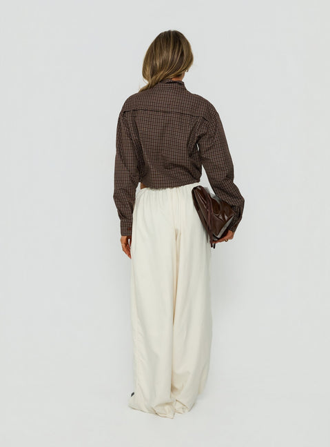 Featuring high-rise waist the Bungala Oversized Relaxed Pants in Ivory Petite womens-regular-pants with wide-leg silhouette back view of model wearing Princess Polly