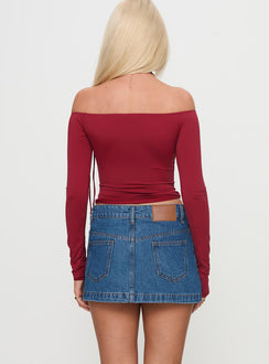 back view of model wearing Princess Polly Nicolina Low Rise Denim Mini Skirt Light Wash Tall Mini Skirts Skirts 