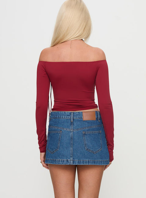 back view of model wearing Princess Polly Nicolina Low Rise Denim Mini Skirt Light Wash Tall Mini Skirts Skirts 