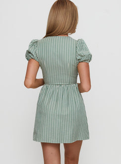 back view of model wearing Princess Polly Nurture Bow Mini Dress Green Stripe Crew Neck 