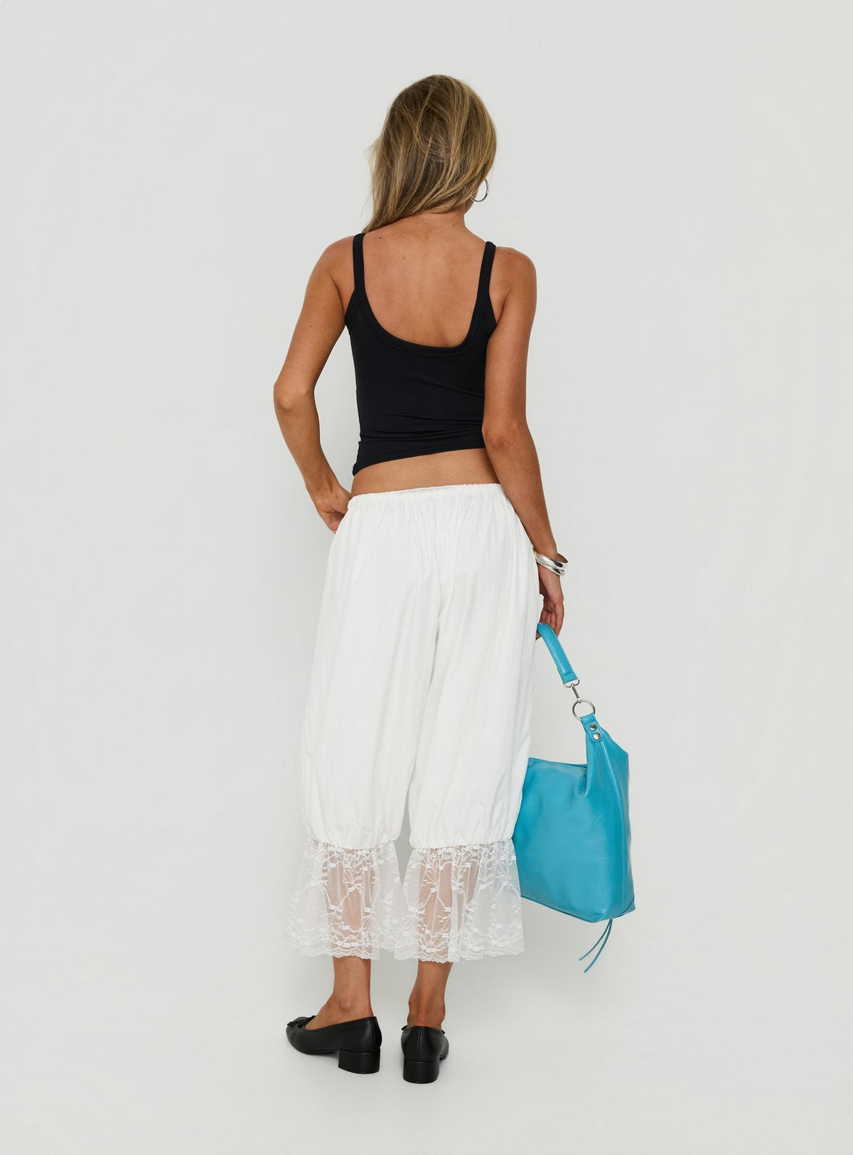 Presenting the Daiana Lace Culotte Pants Cream womens-regular-pants with mid-rise back view of model wearing