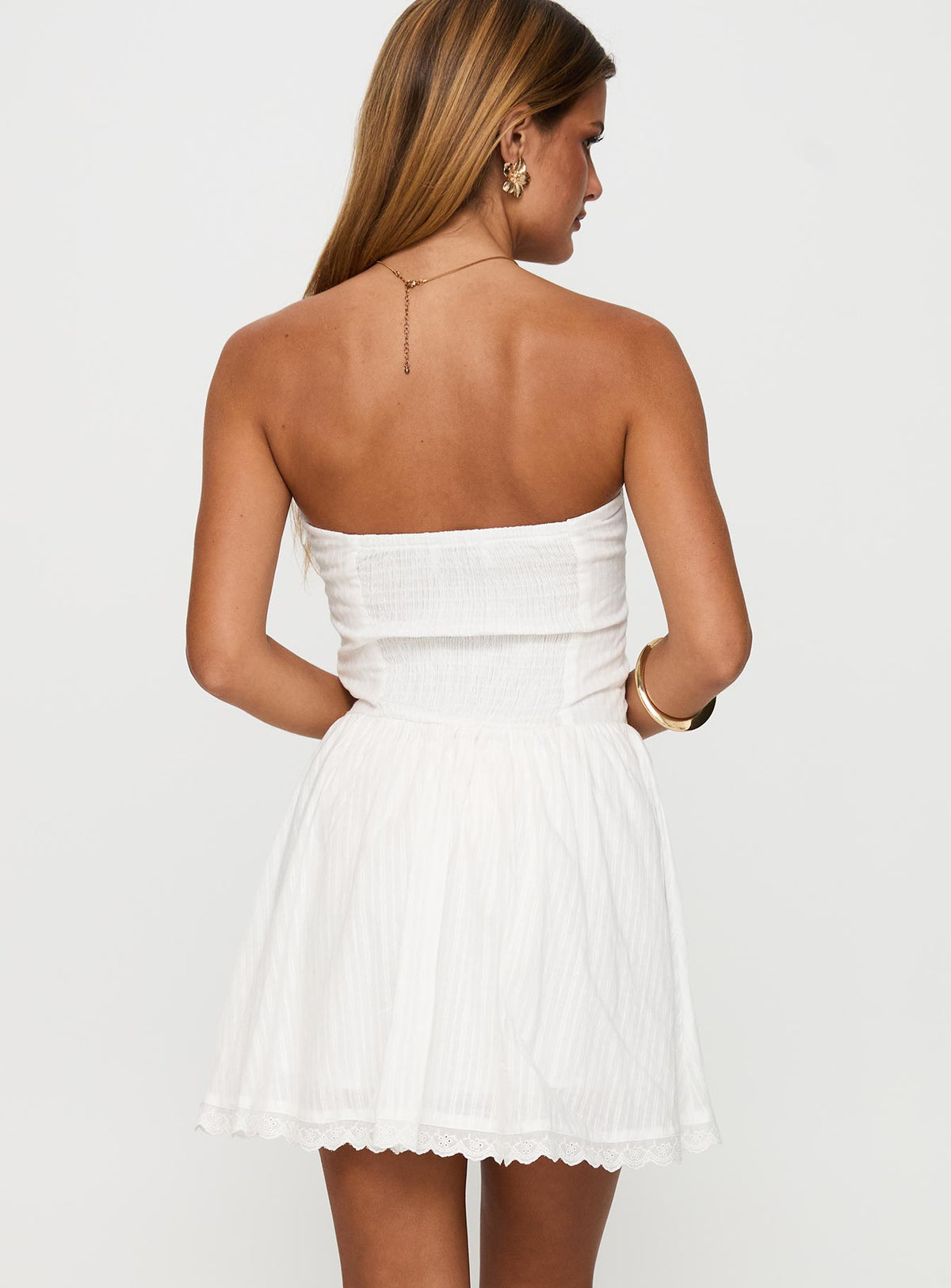 back view of model wearing Princess Polly Mirella Strapless Mini Dress White Straight Neck 