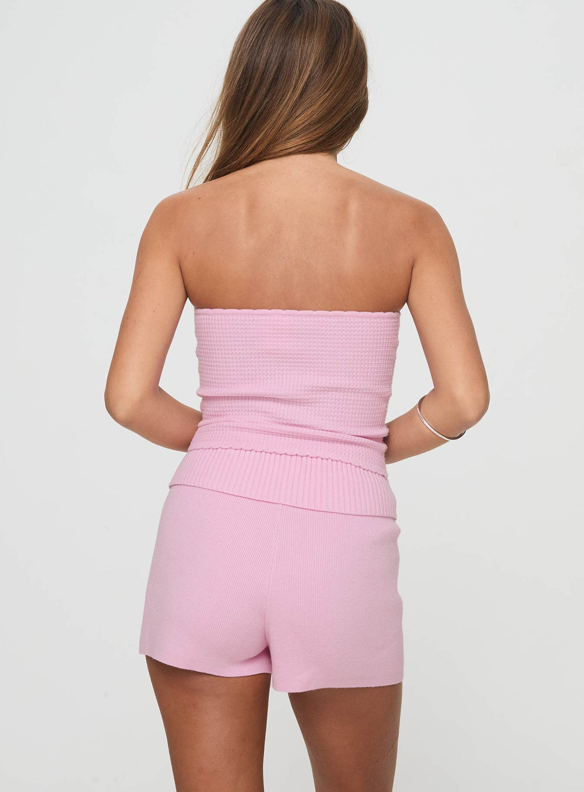 back view of model wearing Princess Polly Jhett Knit Shorts Pink High Waisted Shorts 