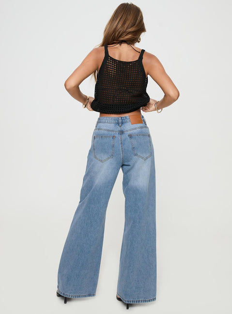 back view of model wearing Princess Polly Colemane Mid Rise Flared Jeans Angel Blue High Rise Jeans Jeans 