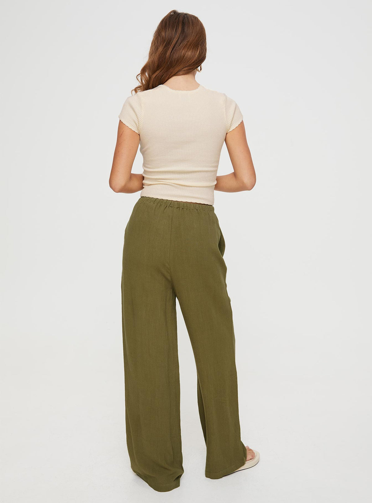 back view of model wearing Princess Polly Parklea Pants Sage Mid Rise Pants Pants 