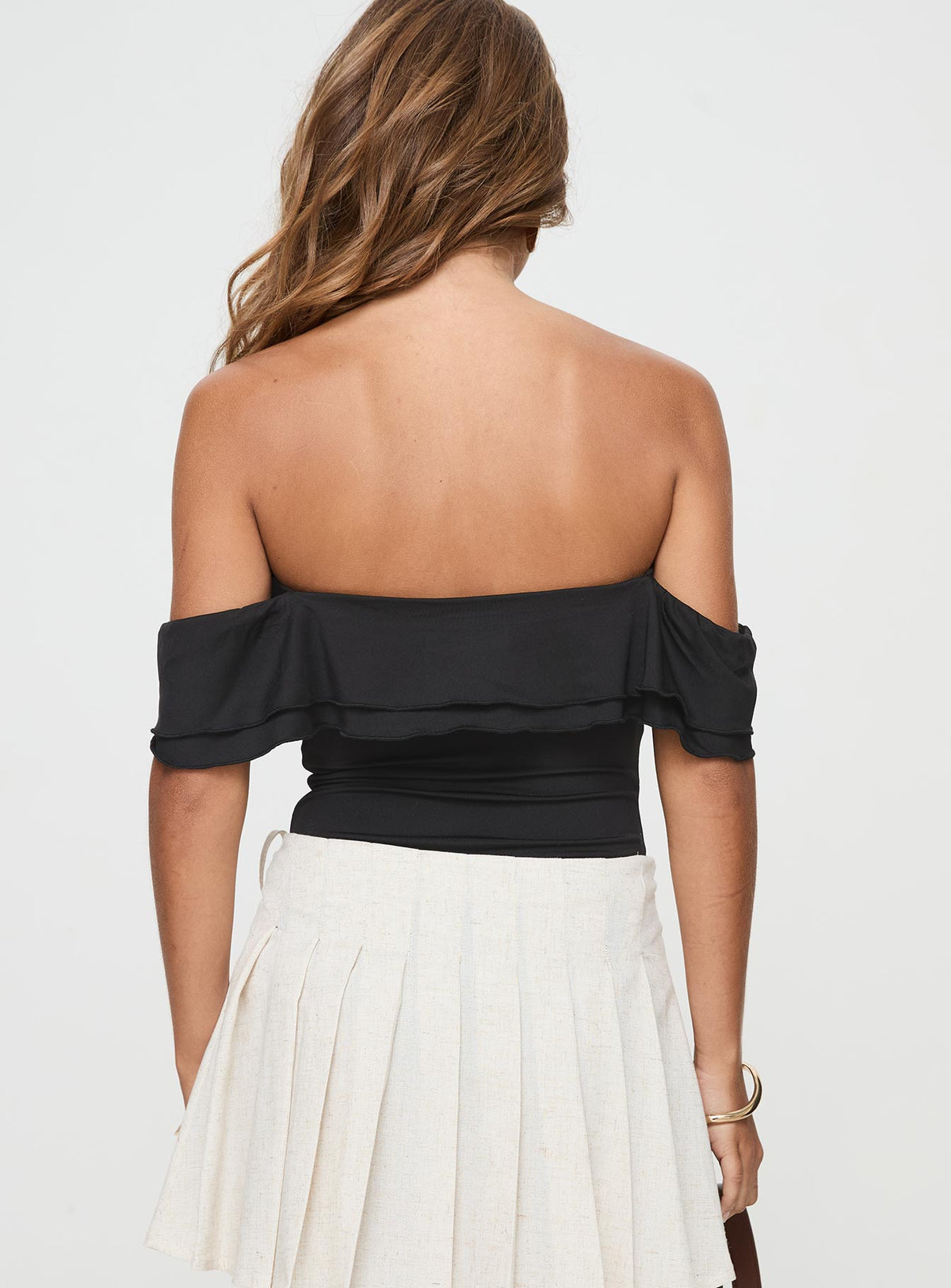 back view of model wearing Princess Polly Coming Back Ruffle Bodysuit Black Sleeveless Bodysuit 