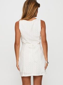 back view of model wearing Princess Polly Pacie Broderie Mini Dress White Crew Neck 
