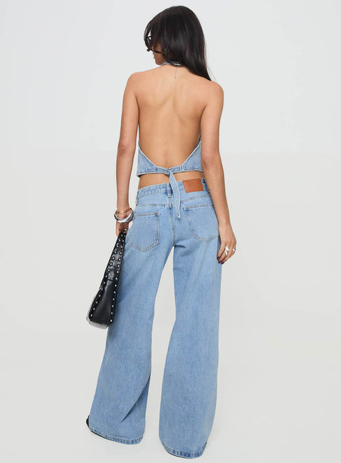 back view of model wearing Princess Polly Pearlisle Low Rise Baggy Jeans Light Wash Low Rise Jeans Jeans 