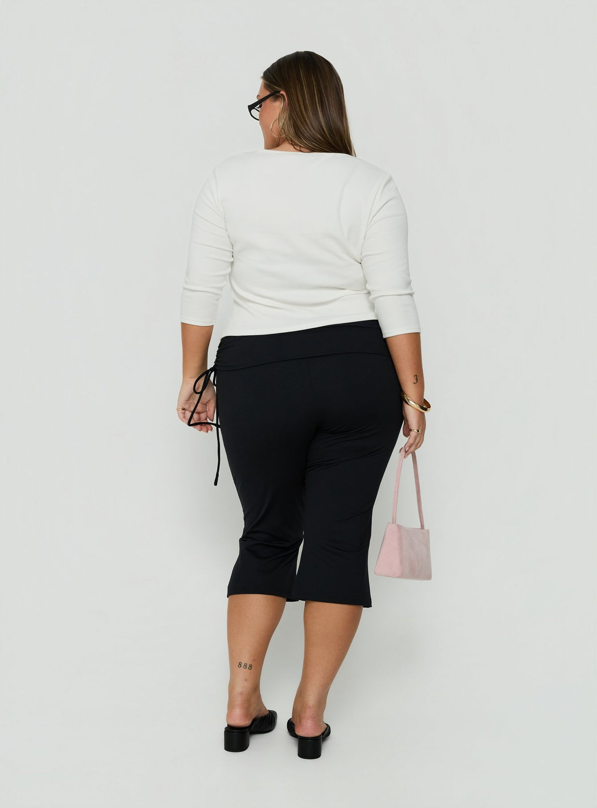 Introducing Bailor Channel Waistband Capri Pants Black Curve womens-regular-pants with high-rise back view of model wearing Princess Polly