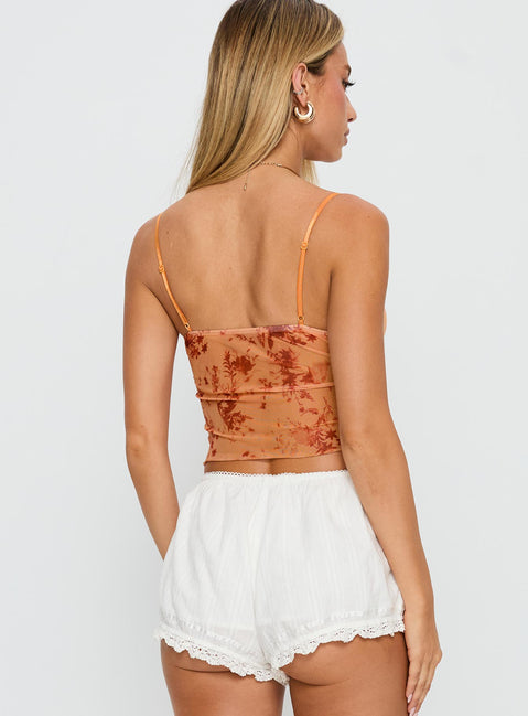 back view of model wearing Princess Polly Shepherd Top Orange Floral Sleeveless V-Neck 