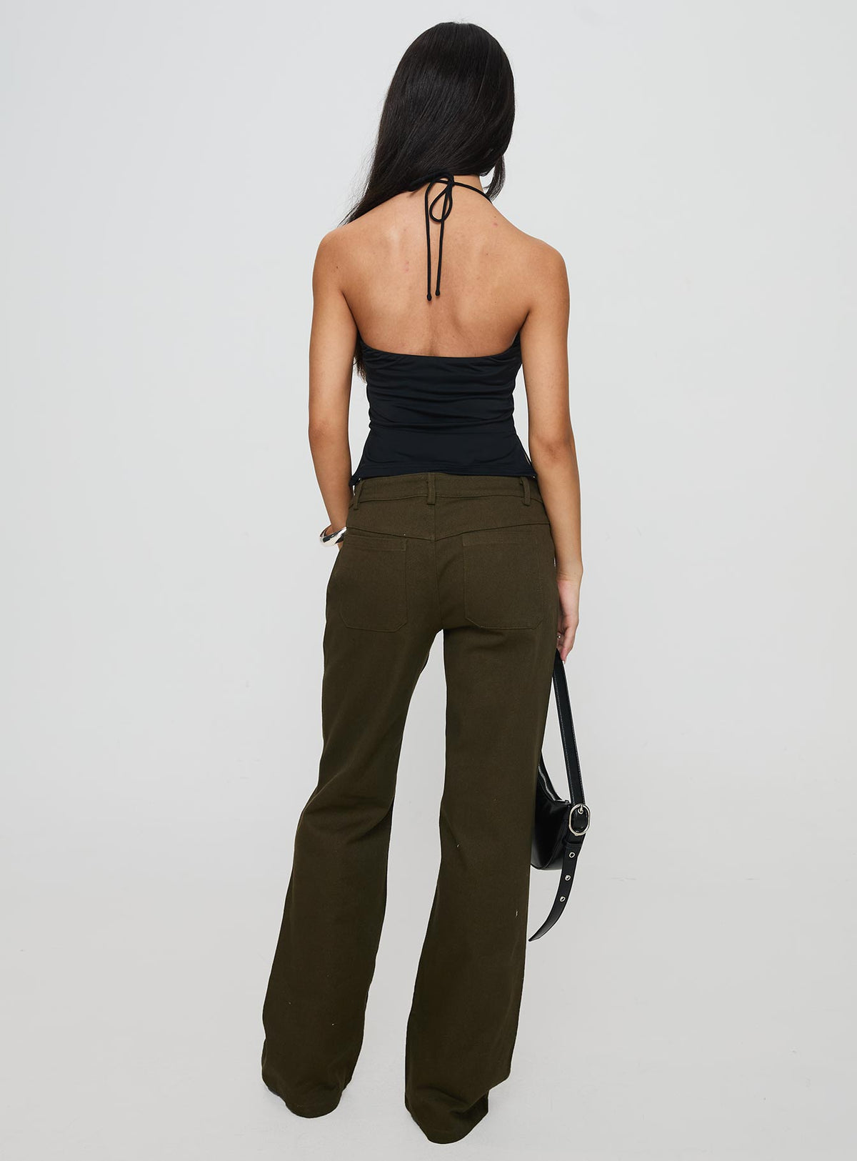 back view of model wearing Princess Polly Benicale Low Rise Cargo Pants Olive Pants 