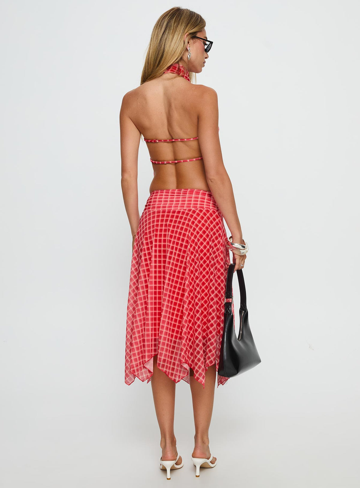 back view of model wearing Princess Polly Scenic Route Asymmetrical Midi Skirt Red Check Midi Skirts Skirts 
