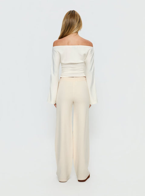 back view of model wearing Princess Polly Felisha Low Waist Knit Pants White Mid Rise Pants Pants 