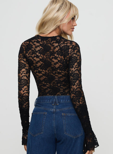 back view of model wearing Princess Polly Giallo Long Sleeve Bodysuit Black Long Sleeve Tops Bodysuit 