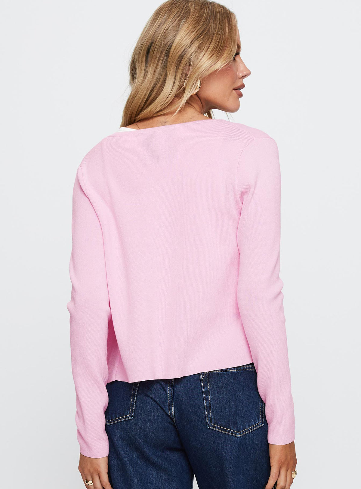 back view of model wearing Princess Polly Old Burlington Knit Cardigan Pink Cropped Jumpers Jumpers 