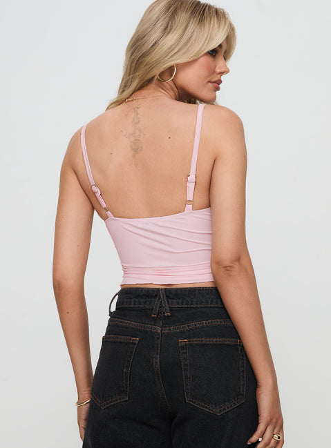 back view of model wearing Princess Polly Greyer Top Pink Sleeveless Plunger 