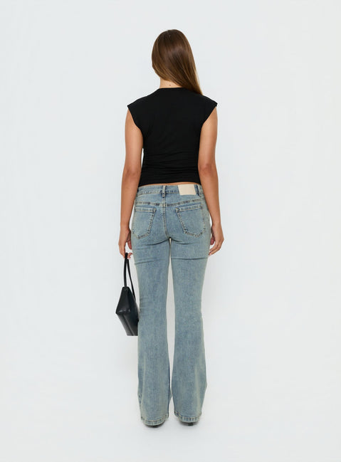 Presenting the Bethany Low Rise Bootleg Jeans Ice Wash womens-jeans with low-rise back view of model wearing