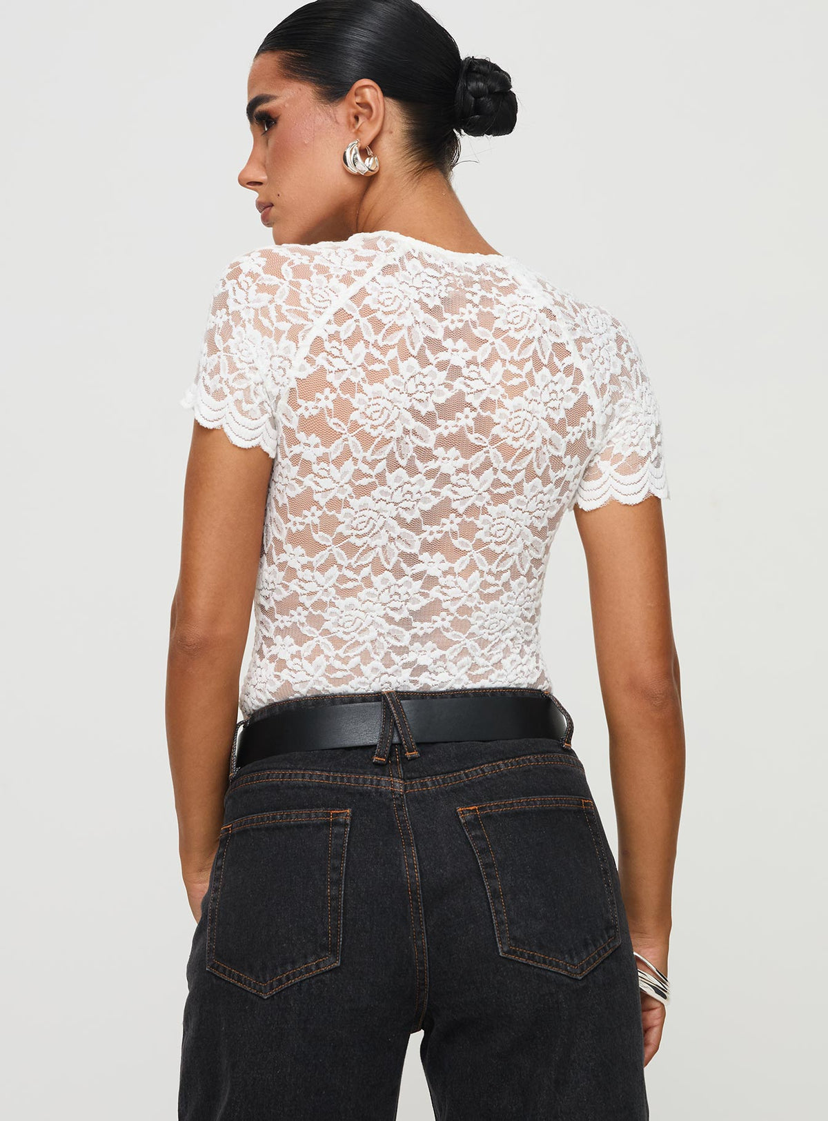 back view of model wearing Princess Polly Giallo Bodysuit White Short Sleeve Bodysuit 