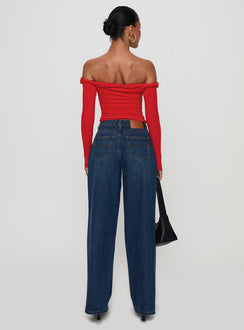 back view of model wearing Princess Polly Naylor Rip Mid Rise Wide Leg Jeans Dark Blue Wash Mid Rise Jeans Jeans 