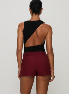 back view of model wearing Princess Polly Centre Stage Cut Out Bodysuit Black Sleeveless Bodysuit 