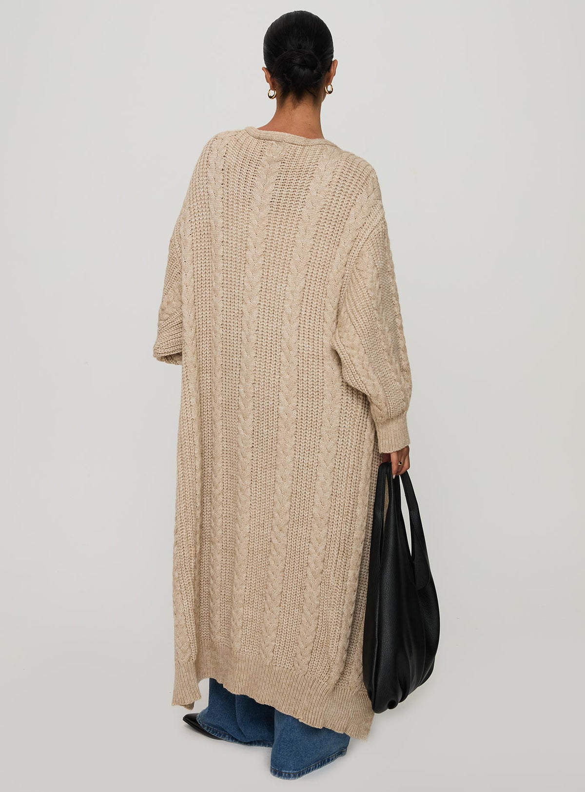back view of model wearing Princess Polly Orkid Cable Knit Cardigan Beige Longline Jumpers Jumpers 