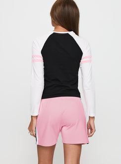 back view of model wearing Princess Polly Bend It Athletic Shorts Pink Low Rise Shorts 