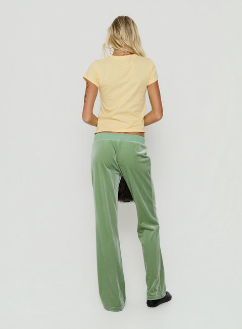 Presenting the Alba Track Pant Sage in womens-regular-pants mid-rise back view of model wearing Princess Polly