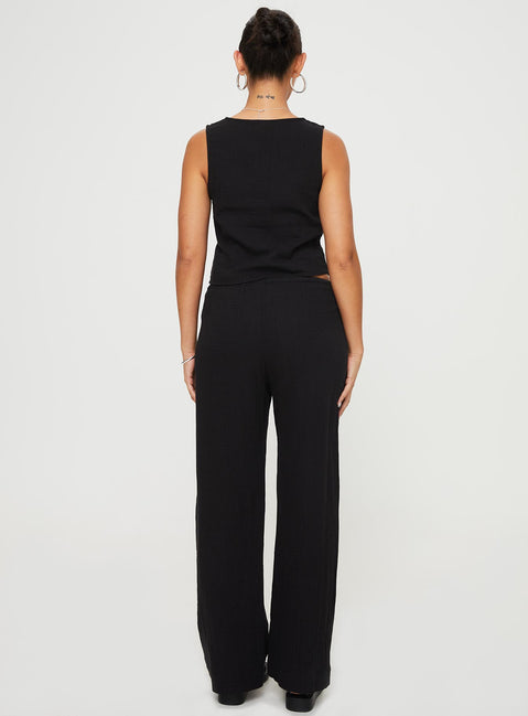 back view of model wearing Princess Polly Zanzibar Pants Black Low Rise Pants Pants 