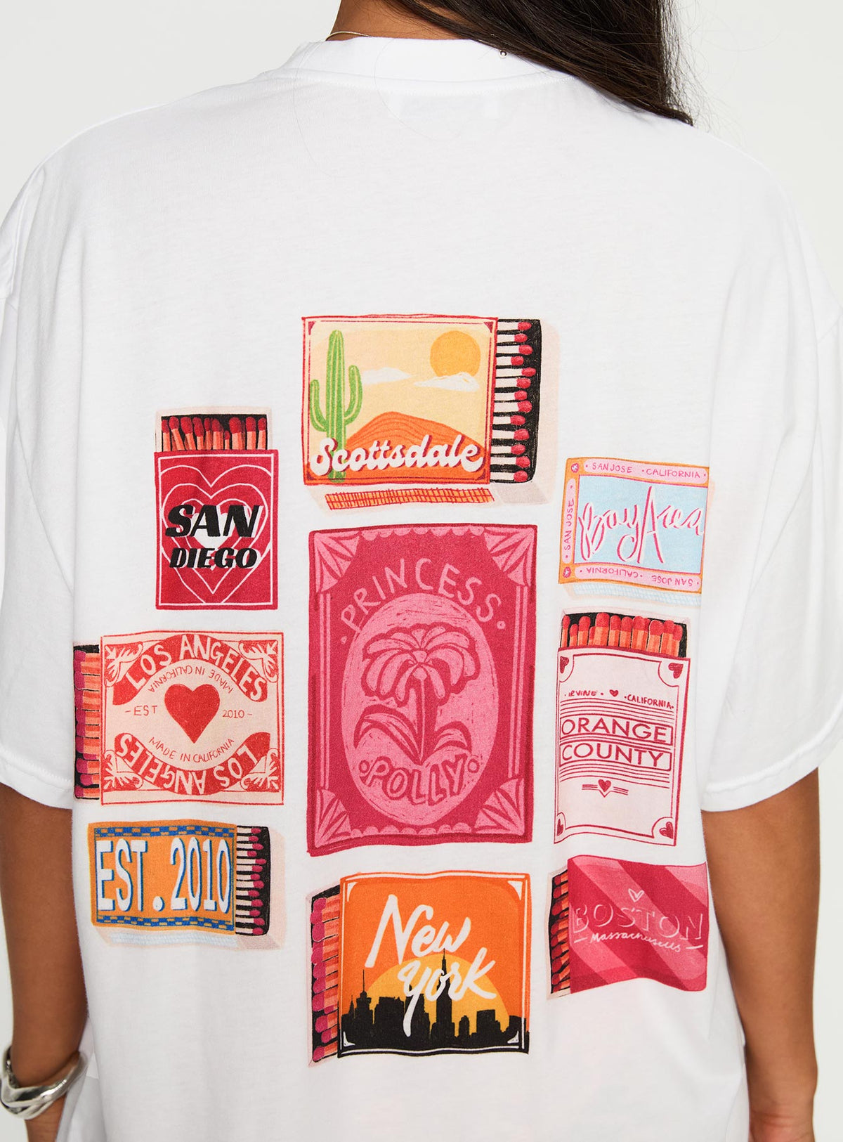 side view of model wearing Princess Polly Matchbox Collection Graphic Top White / Multi Half Sleeves Crew Neck 