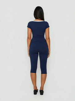 Explore the Rowanna Sporty Capri Pants Navy / Cream womens-regular-pants with high-rise back view of model wearing Princess Polly
