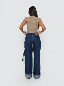 back view of model wearing Princess Polly Darla Low Rise Straight Leg Cuff Jean Dark Blue Wash Low Rise Jeans Jeans 