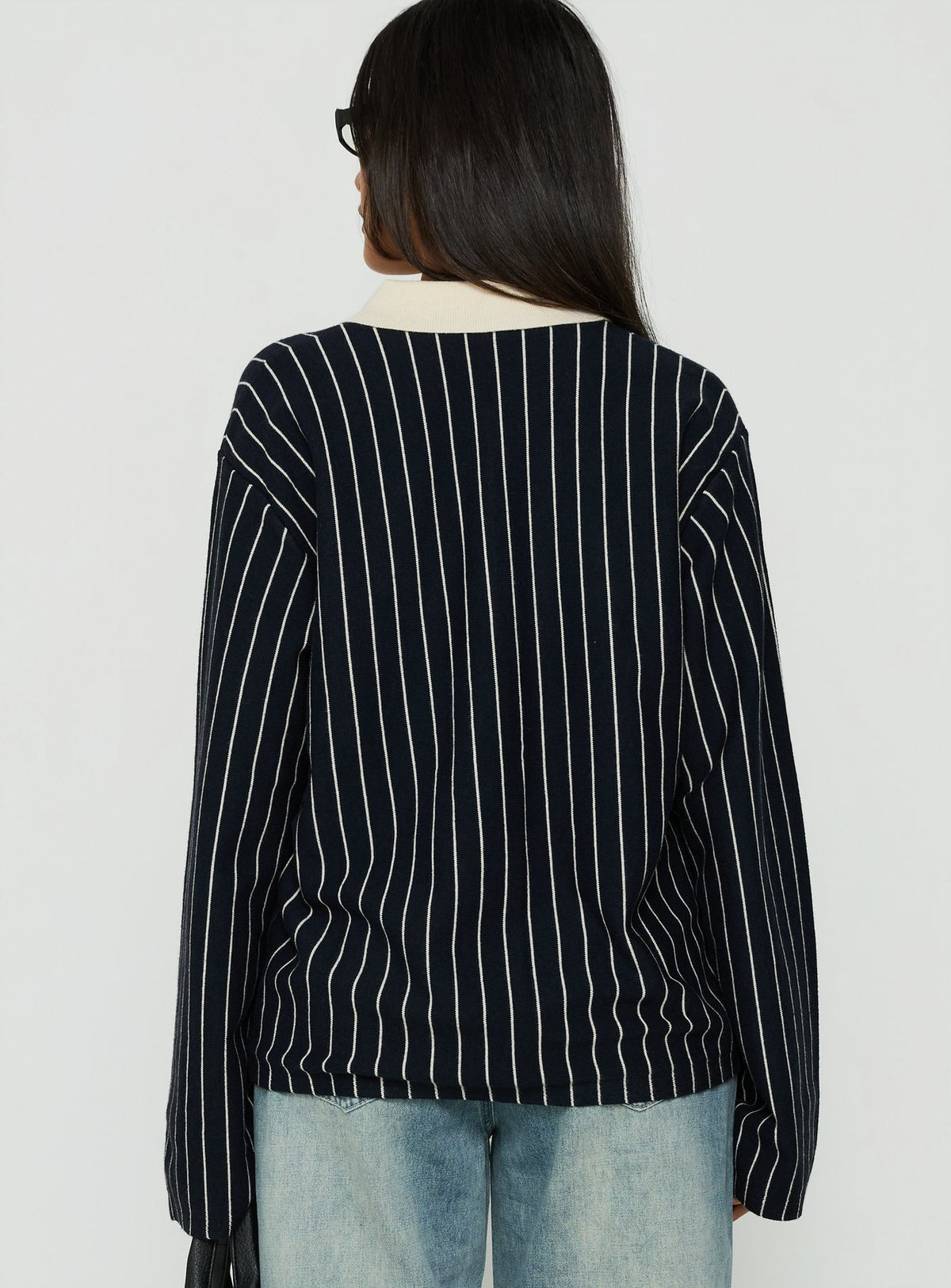 Highlighting the Boarders V Neck Polo Jumper Navy Stripe womens-jumpers in short length with oversized fit back view of model wearing Princess Polly