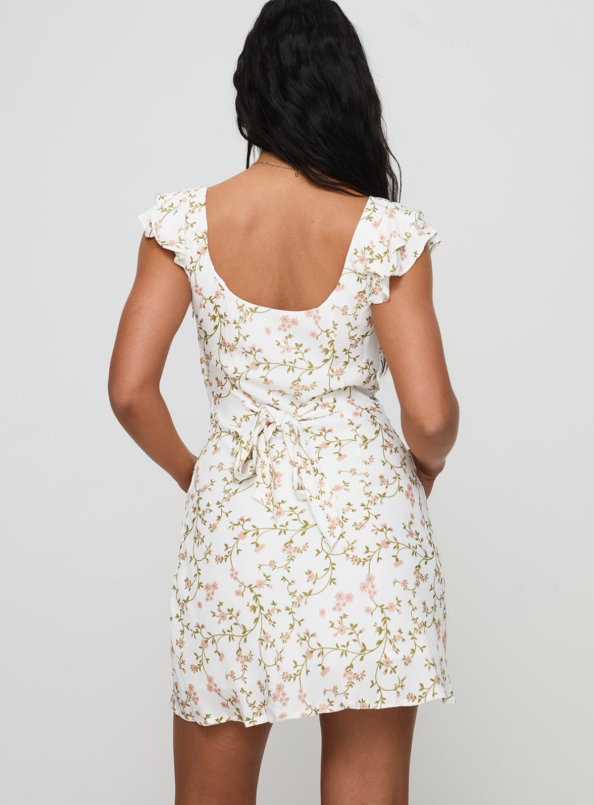 back view of model wearing Princess Polly Whitechapel Mini Dress Multi Square Neck 