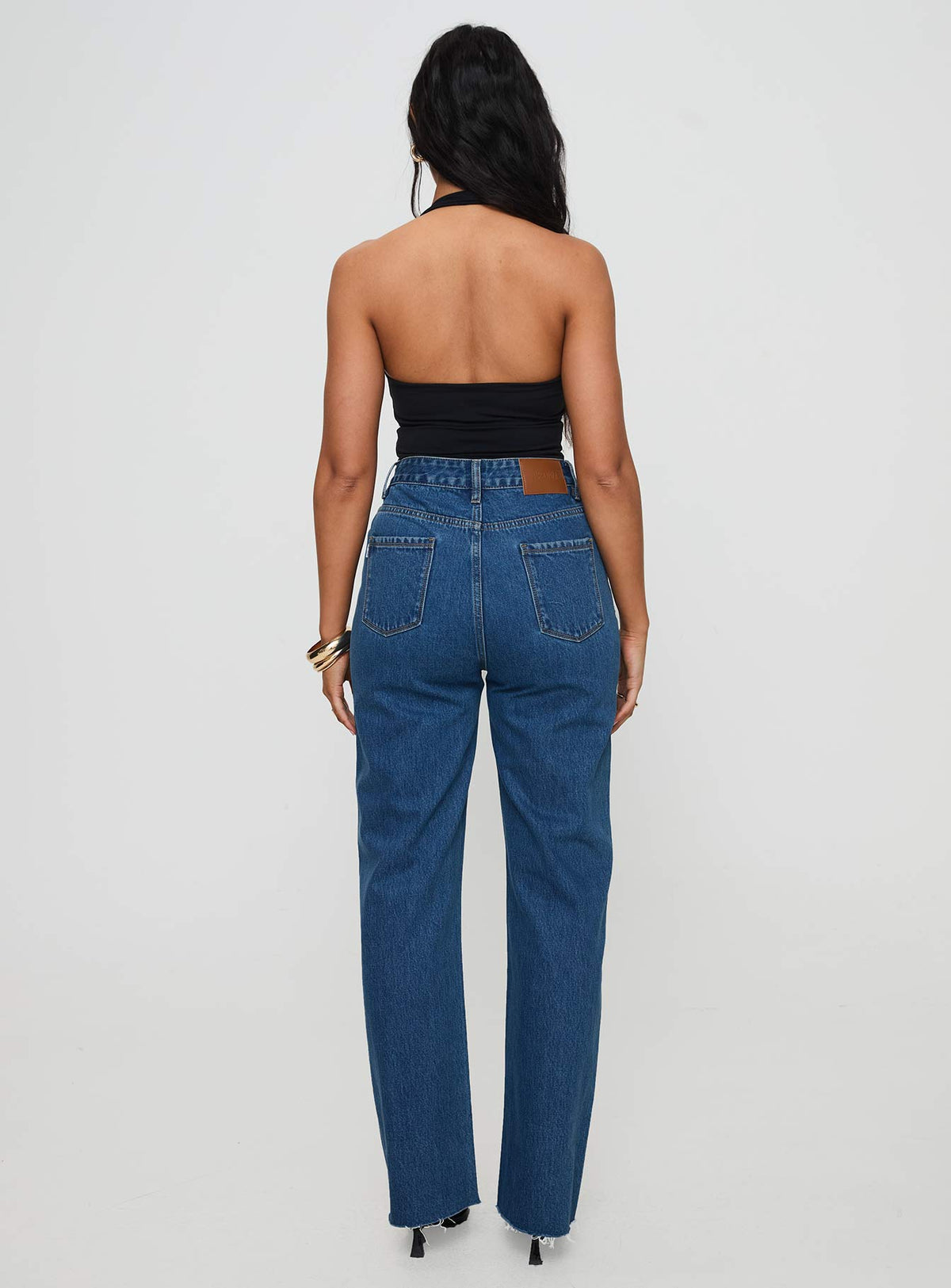back view of model wearing Princess Polly Kalinda High Rise Straight Leg Jeans Mid Blue High Rise Jeans Jeans 